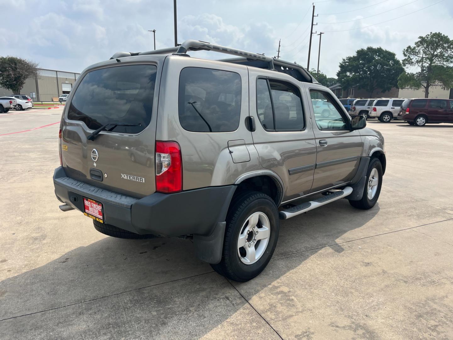 2004 GOLD /gray Nissan Xterra (5N1ED28T84C) , Automatic transmission, located at 14700 Tomball Parkway 249, Houston, TX, 77086, (281) 444-2200, 29.928619, -95.504074 - Photo#6